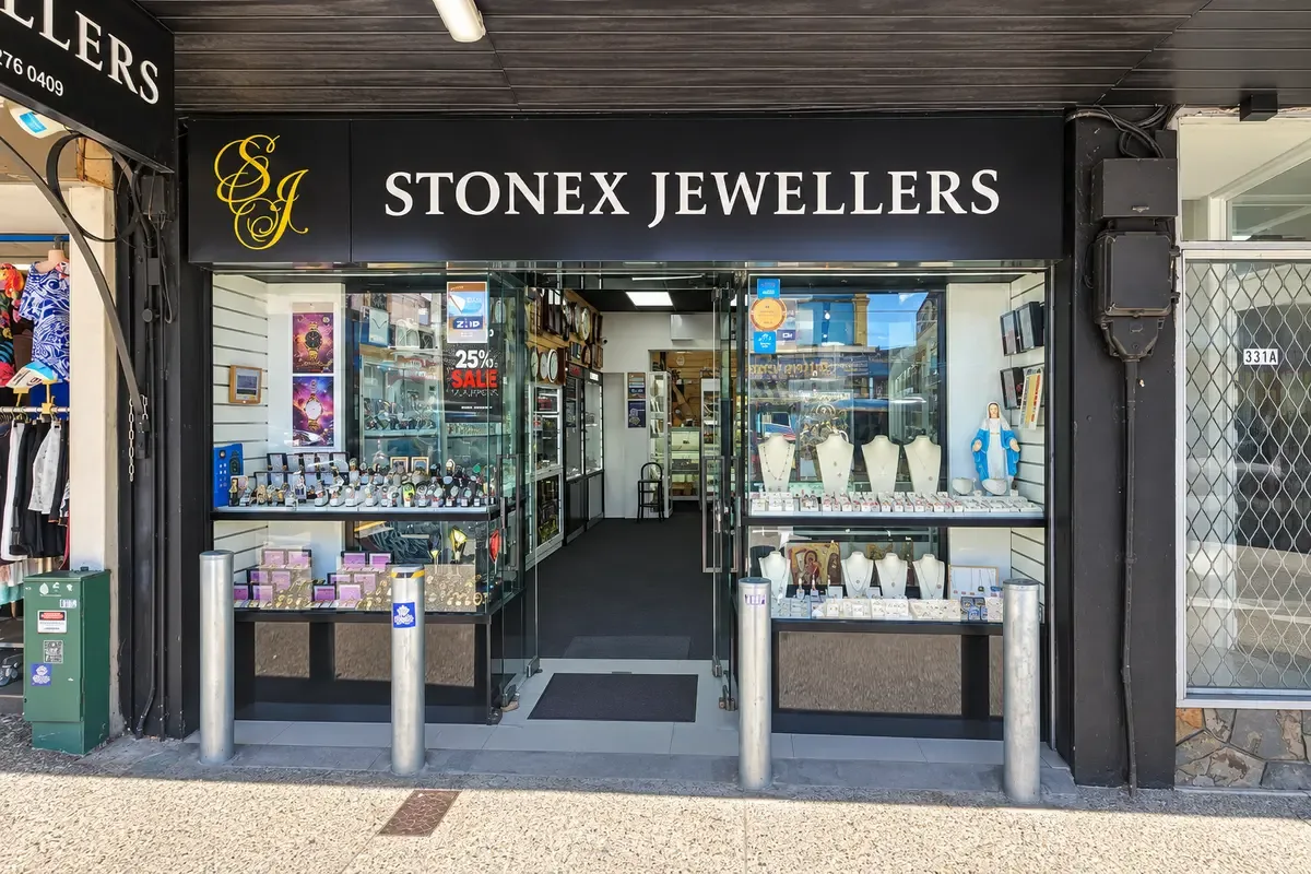 The Stonex Jewellers shopfront, with window displays of watches and jewellery