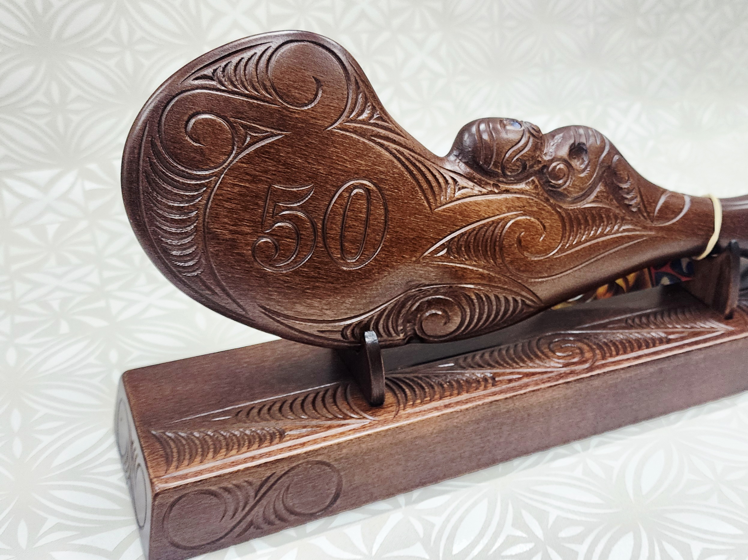 Hand Carved 50th Wahaika on Base with Island Patterns with Paua Shell Eyes 21st Keys Hand Carved 50th Wahaika on Base with Island Patterns with Paua Shell Eyes 21st Keys