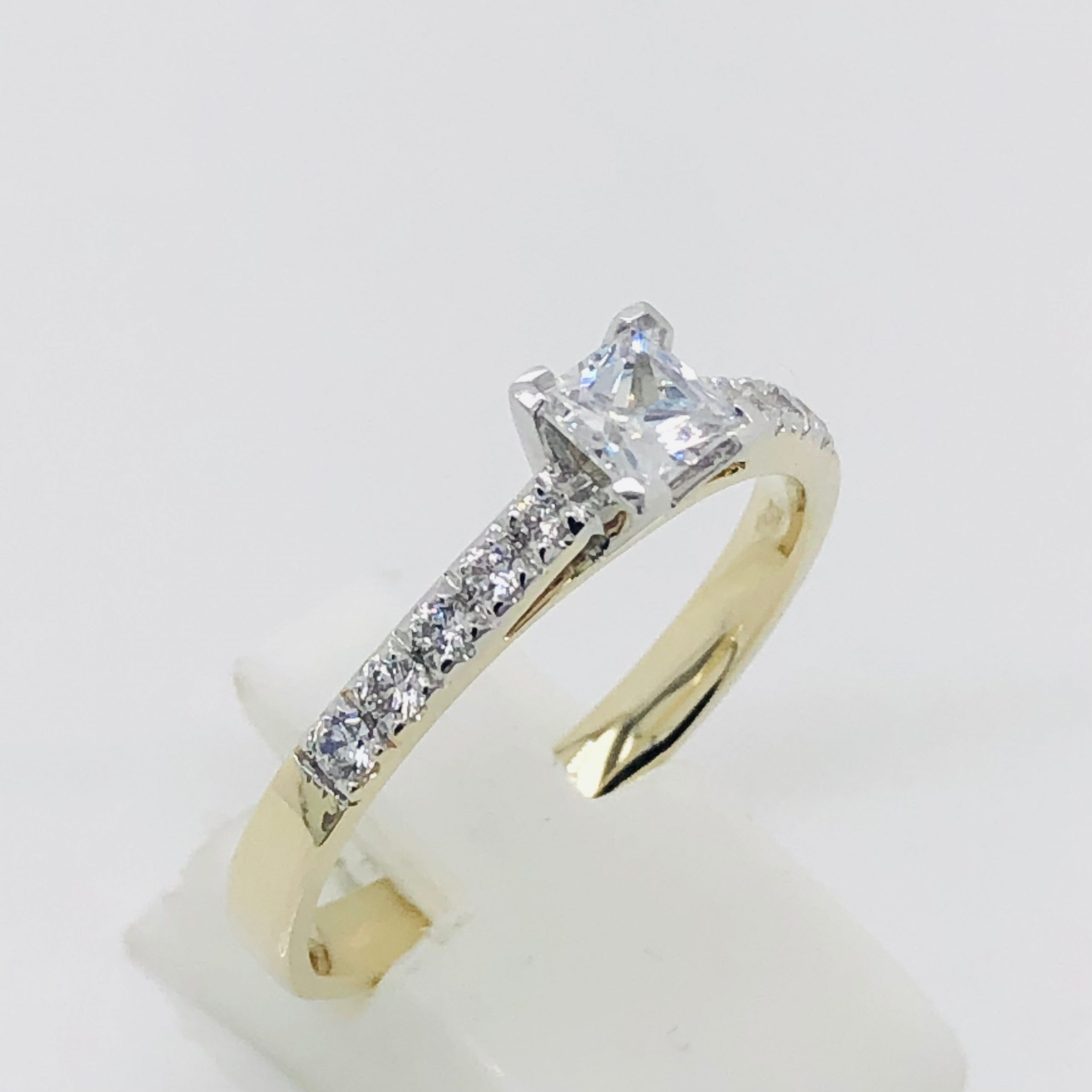 9ct Gold Engagement Ring with Square Princess Cut Cubic Zirconia center stone, with Round Cubic Zirconia Stones Down The Side 9ct Gold Ring, Gold Jewellery, Gold Rings 