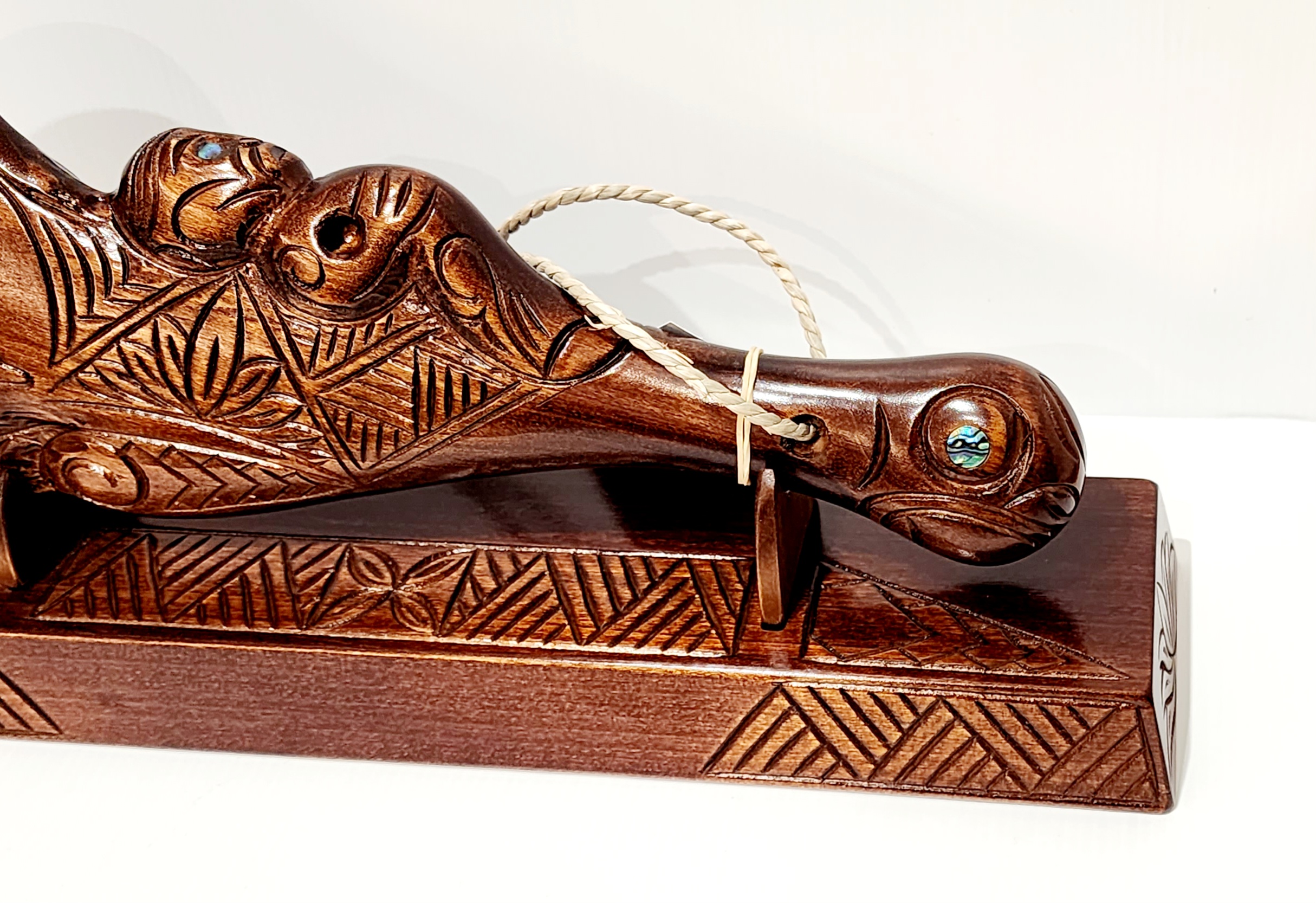 Hand Carved 21st Wahaika on Base with Island Patterns with Paua Shell Eyes 21st Keys Hand Carved 21st Wahaika on Base with Island Patterns with Paua Shell Eyes 21st Keys