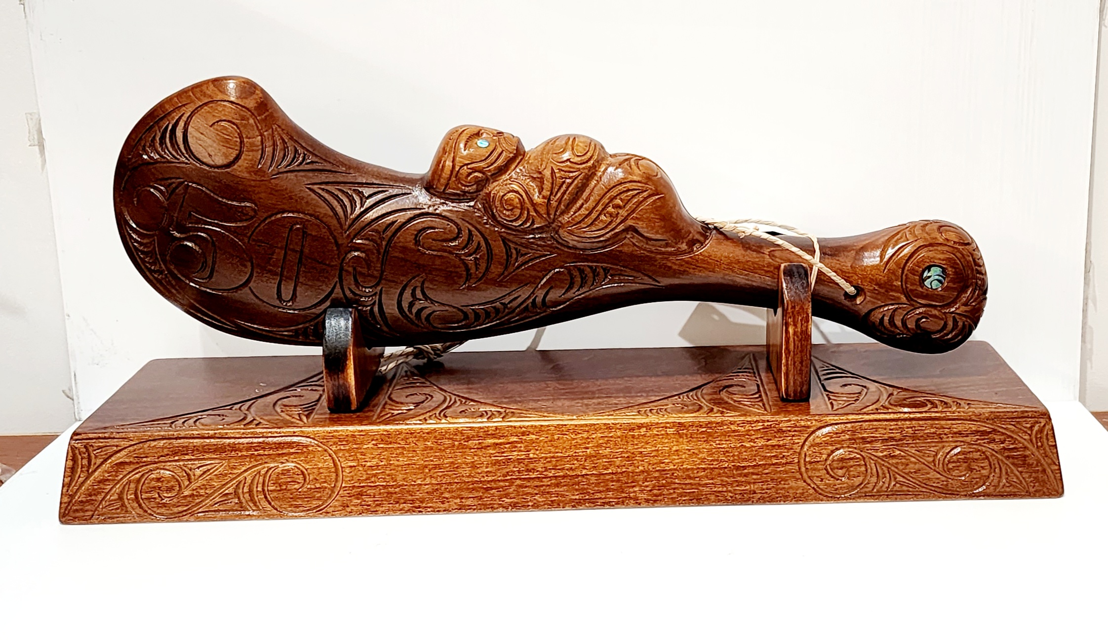 Large Carved Maori Wahaika Club with Carved 50 on Stand 21st Keys 