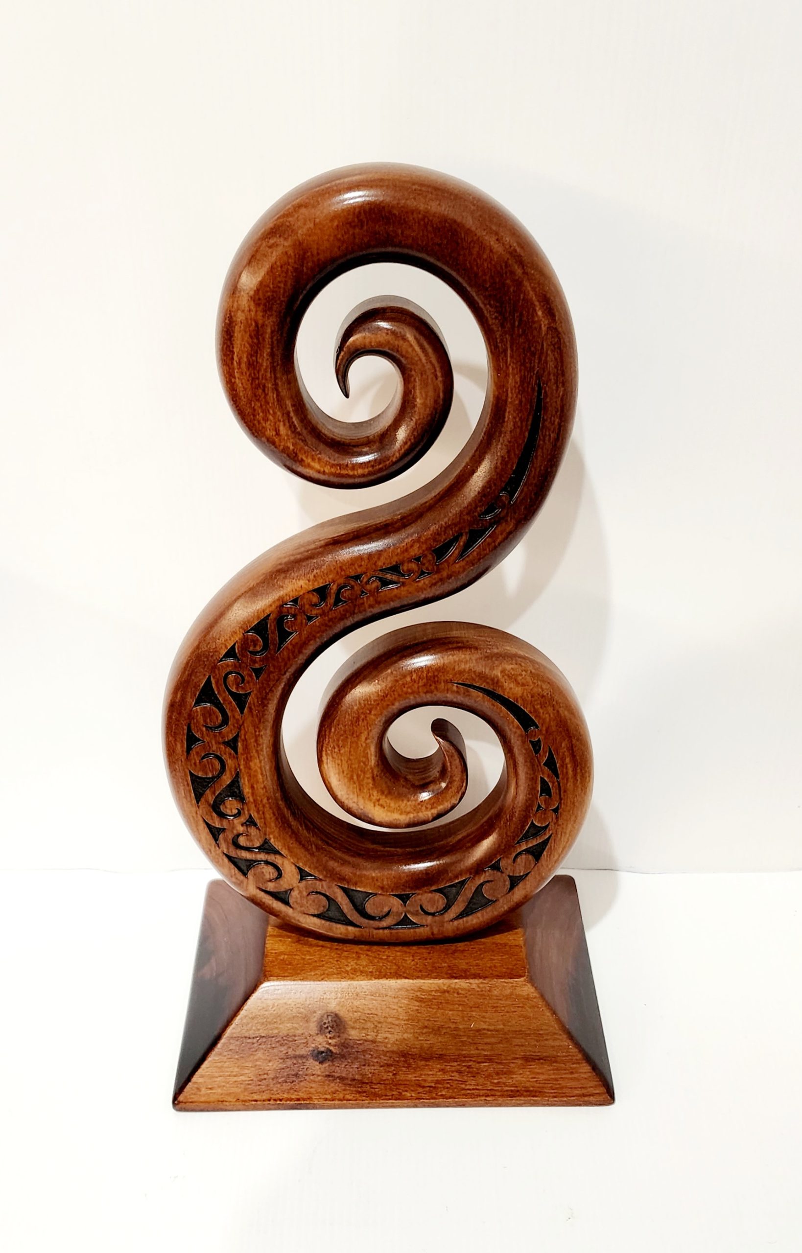 Wooden Carved Large Maori Carved Double Koru and Laser Engraved Patterns on Stand 21st Keys Wooden Carved Large Maori Carved Double Koru and Laser Engraved Patterns on Stand 21st Keys
