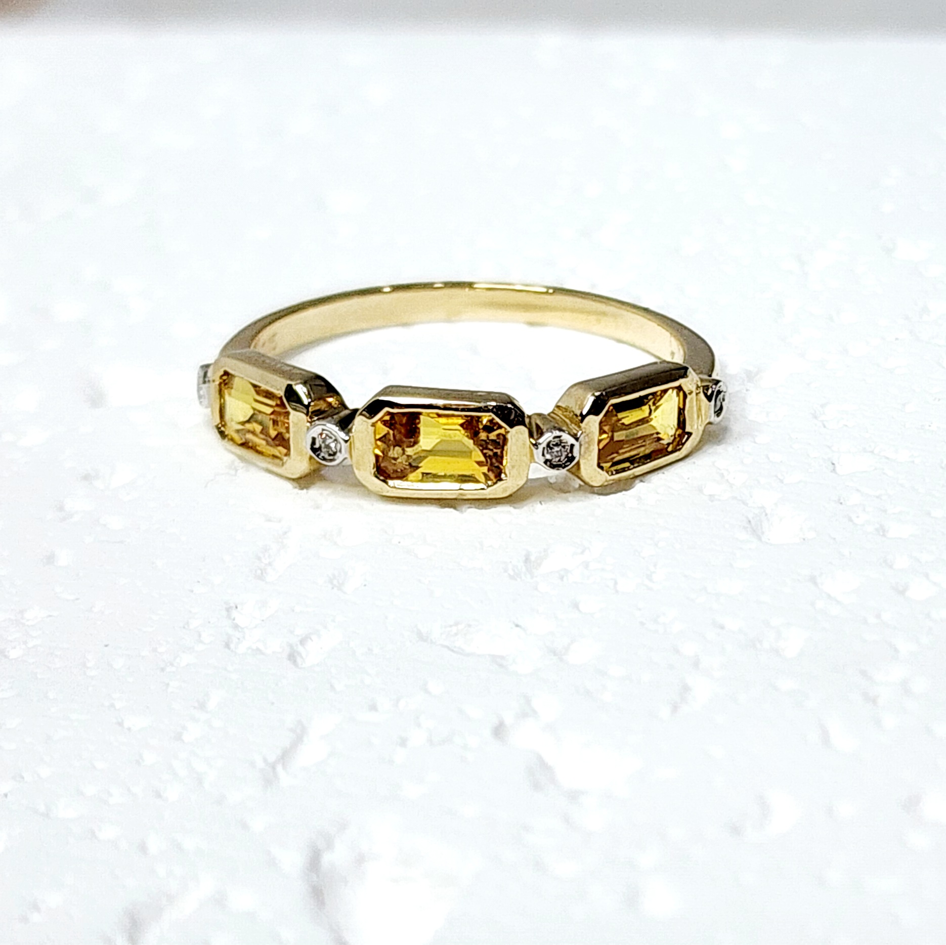 9ct Yellow Gold Dress Ring with 1.15ct Yellow Sapphire and 0.02ct Diamond Setting Gold Rings 9ct Yellow Gold Dress Ring with 1.15ct Yellow Sapphire and 0.02ct Diamond Setting Gold Rings
