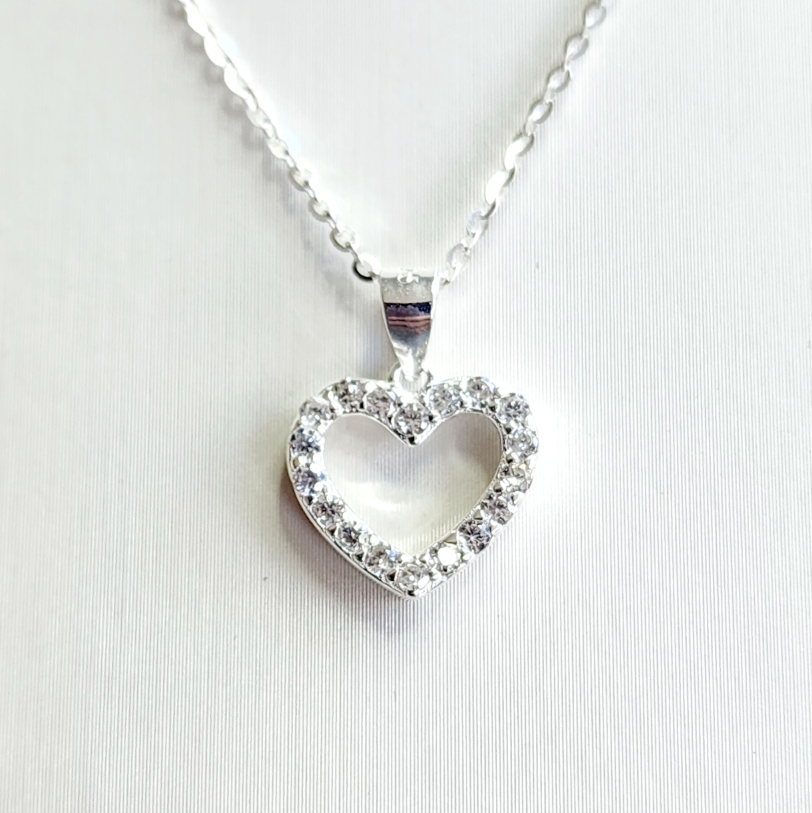 Sterling Silver Open Heart Pendant with Cubic Zirconia and Sterling Silver Chain Sterling Silver Pendants Sterling Silver Open Heart Pendant with Cubic Zirconia and Sterling Silver Chain Sterling Silver Pendants