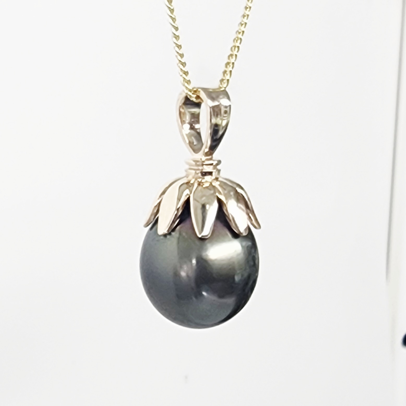 9CT Yellow Gold Tahitian Black Pearl Pendant – 11.5mm–12mm Teardrop Pearl - 9CTTZZTBP Seiko 9CT Yellow Gold Tahitian Black Pearl Pendant – 11.5mm–12mm Teardrop Pearl - 9CTTZZTBP Seiko