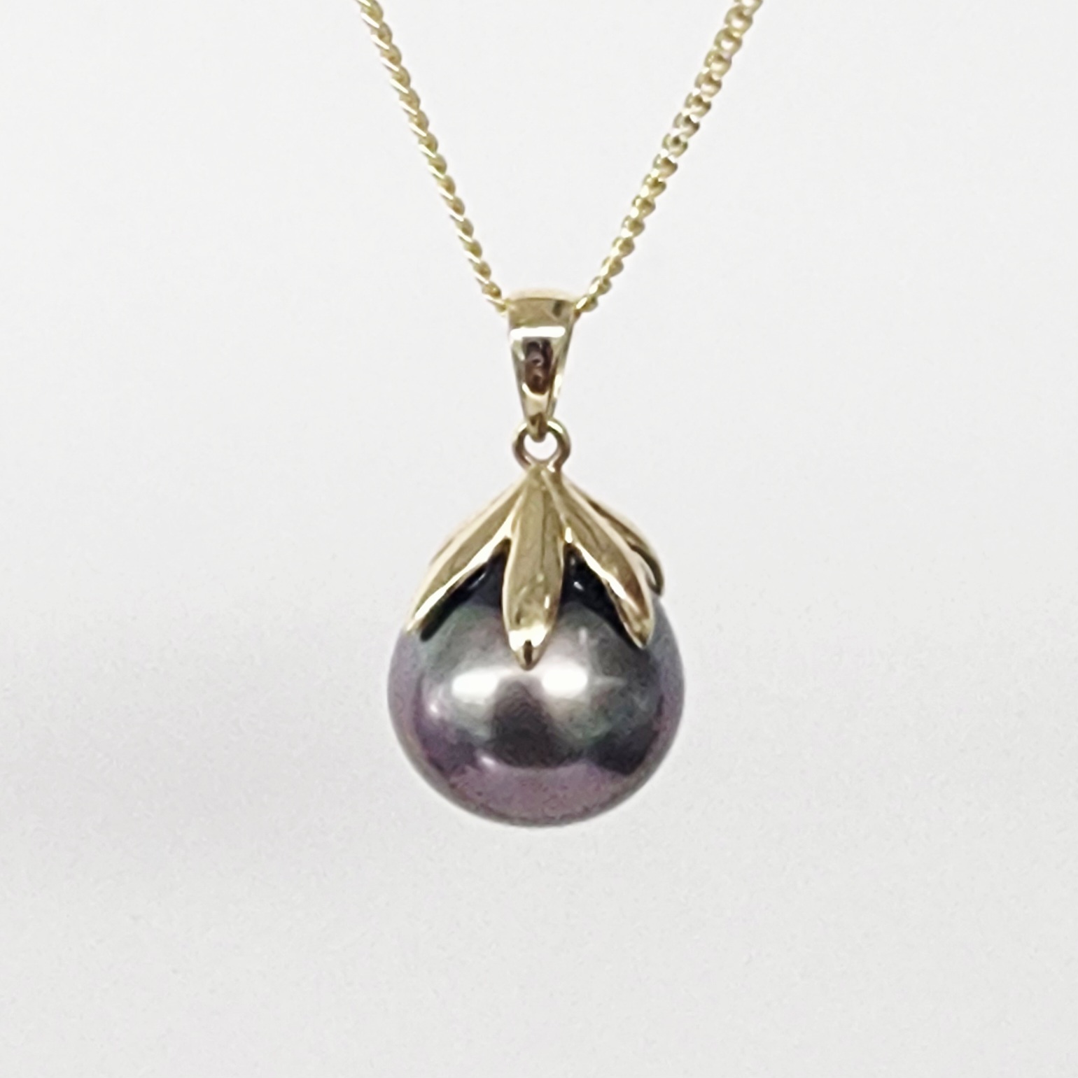 9CT Yellow Gold Tahitian Black Pearl Pendant – 12mm–12.5mm Round Pearl - 9CTTRLTBP Seiko 9CT Yellow Gold Tahitian Black Pearl Pendant – 12mm–12.5mm Round Pearl - 9CTTRLTBP Seiko