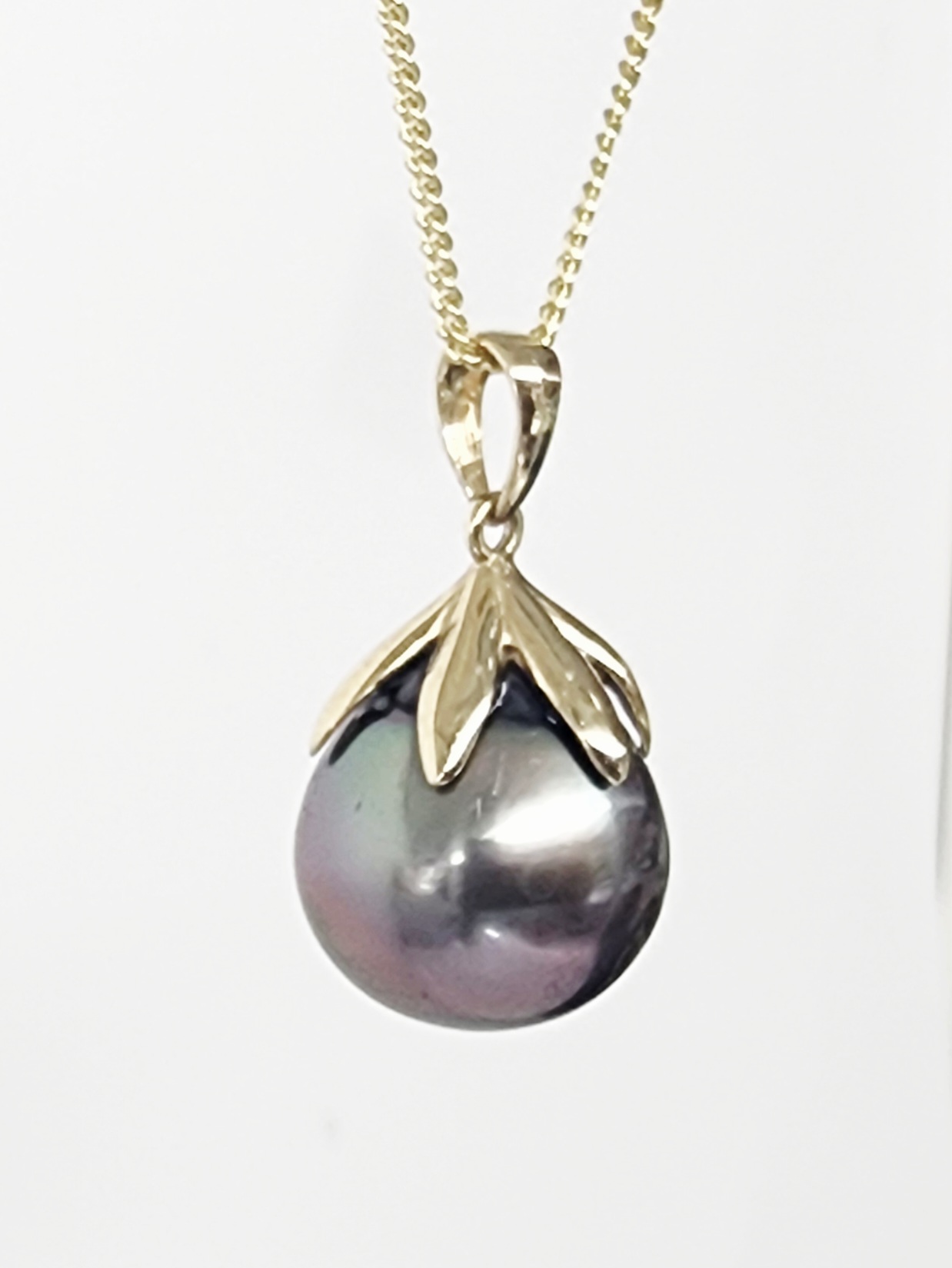 9CT Yellow Gold Tahitian Black Pearl Pendant – 12mm–12.5mm Round Pearl - 9CTTRLTBP Seiko 9CT Yellow Gold Tahitian Black Pearl Pendant – 12mm–12.5mm Round Pearl - 9CTTRLTBP Seiko
