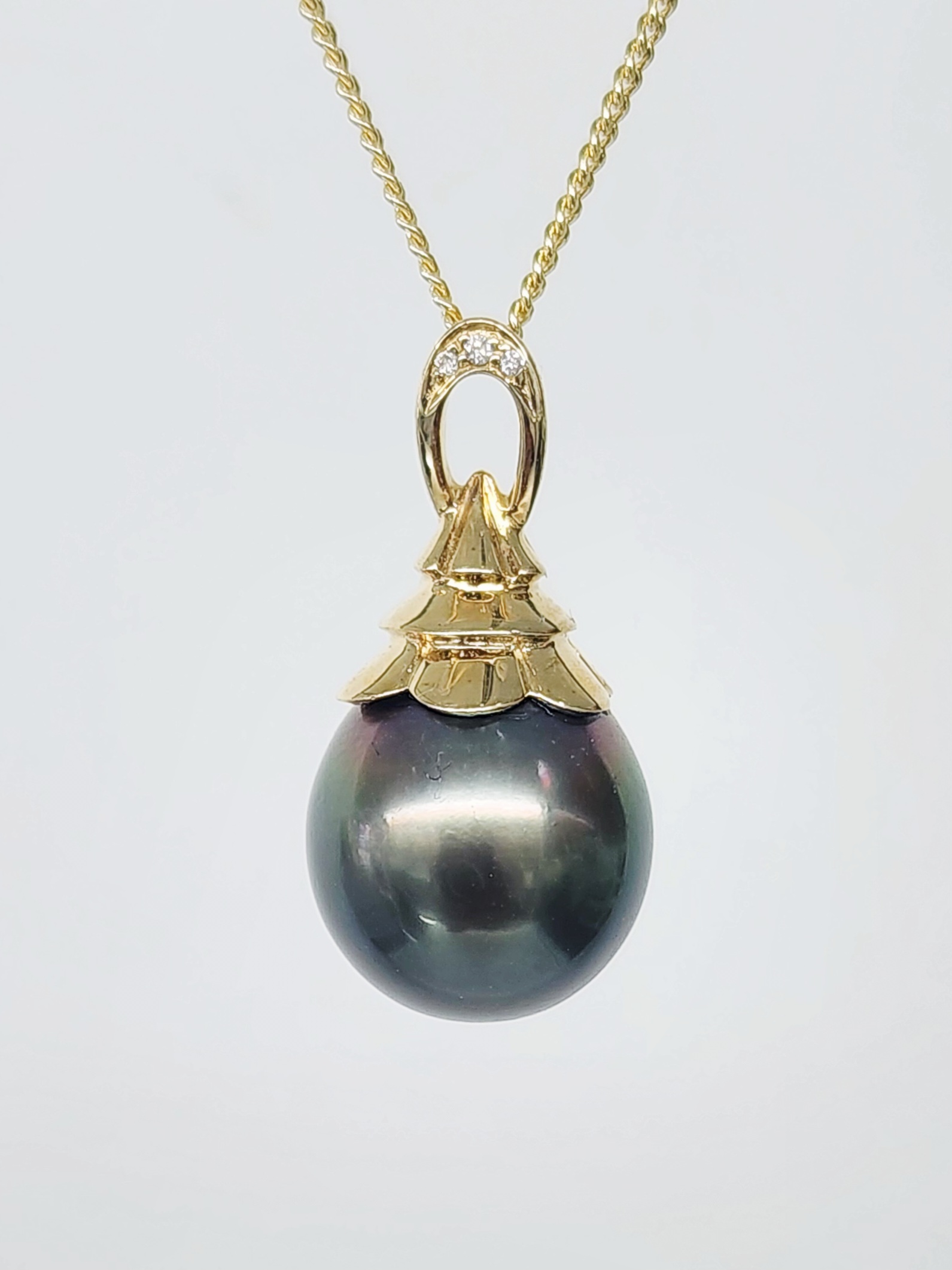 9CT Yellow Gold Tahitian Black Pearl Pendant with Diamond Accents – 11.5mm–12mm - 9CTTLZTBPDIA Seiko 9CT Yellow Gold Tahitian Black Pearl Pendant with Diamond Accents – 11.5mm–12mm - 9CTTLZTBPDIA Seiko