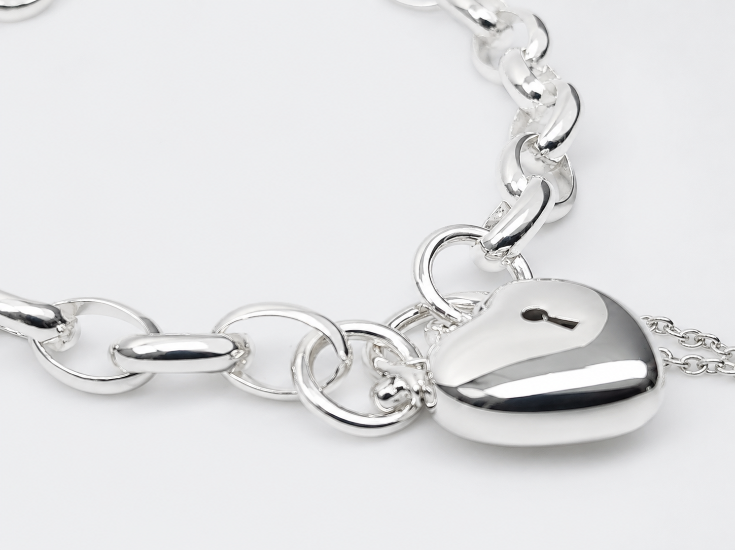 Sterling Silver Solid BO4 Oval Belcher Link Bracelet with Puff Heart Padlock & Safety Chain 18.50cm – Made in New Zealand - BO4BL18.5/PADF15 Seiko Sterling Silver Solid BO4 Oval Belcher Link Bracelet with Puff Heart Padlock & Safety Chain 18.50cm – Made in New Zealand - BO4BL18.5/PADF15 Seiko
