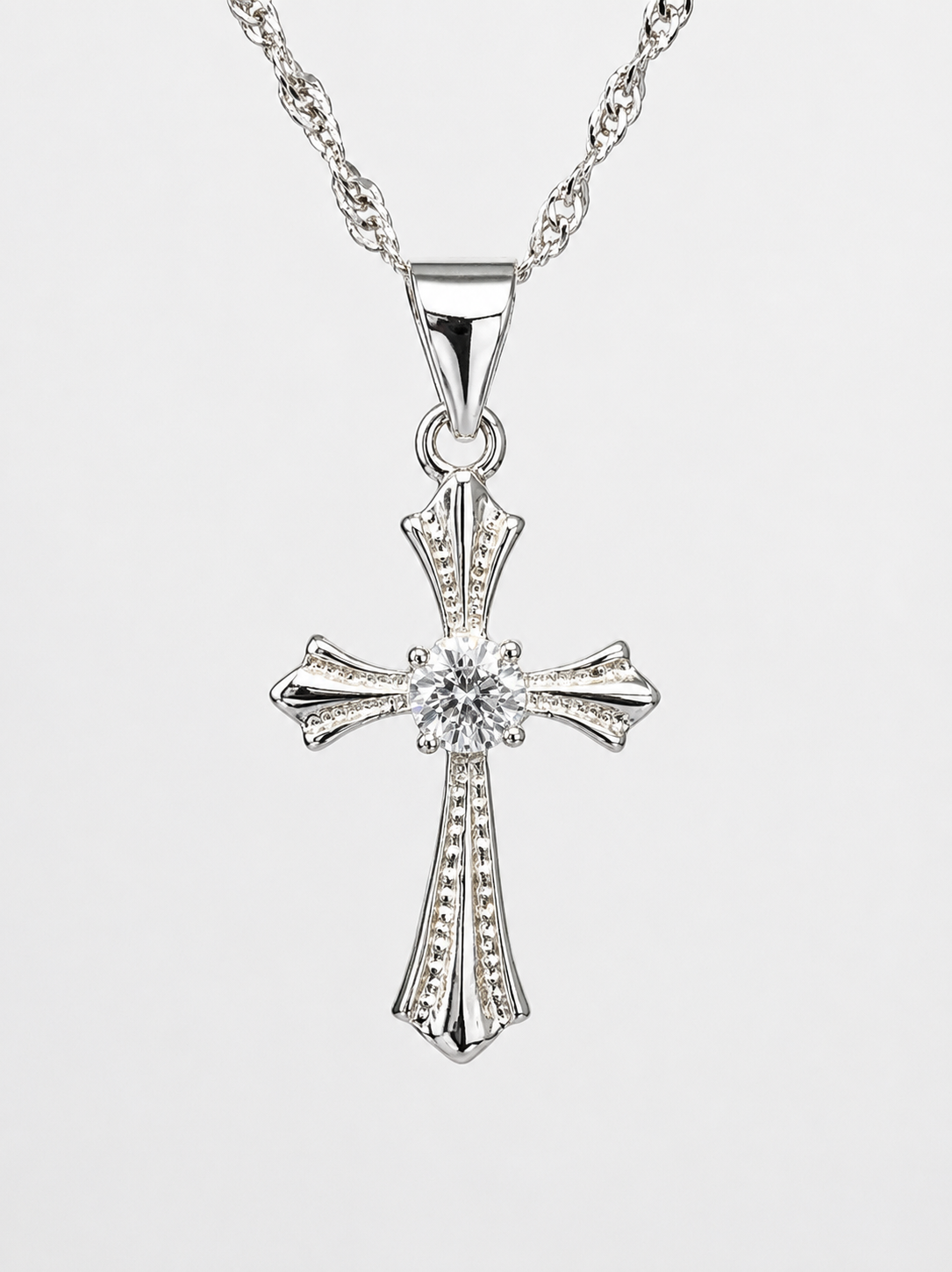 Sterling Silver Cross Pendant with 3.4mm Cubic Zirconia Centre Stone & Complimentary Sterling Silver Chain – 12mm x 20mm - 18006024 Seiko Sterling Silver Cross Pendant with 3.4mm Cubic Zirconia Centre Stone & Complimentary Sterling Silver Chain – 12mm x 20mm - 18006024 Seiko