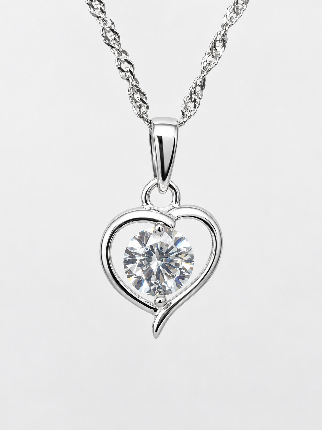 Sterling Silver Heart Pendant with 5.50mm Round Cubic Zirconia & Complimentary Chain - 18027930 Seiko Sterling Silver Heart Pendant with 5.50mm Round Cubic Zirconia & Complimentary Chain - 18027930 Seiko