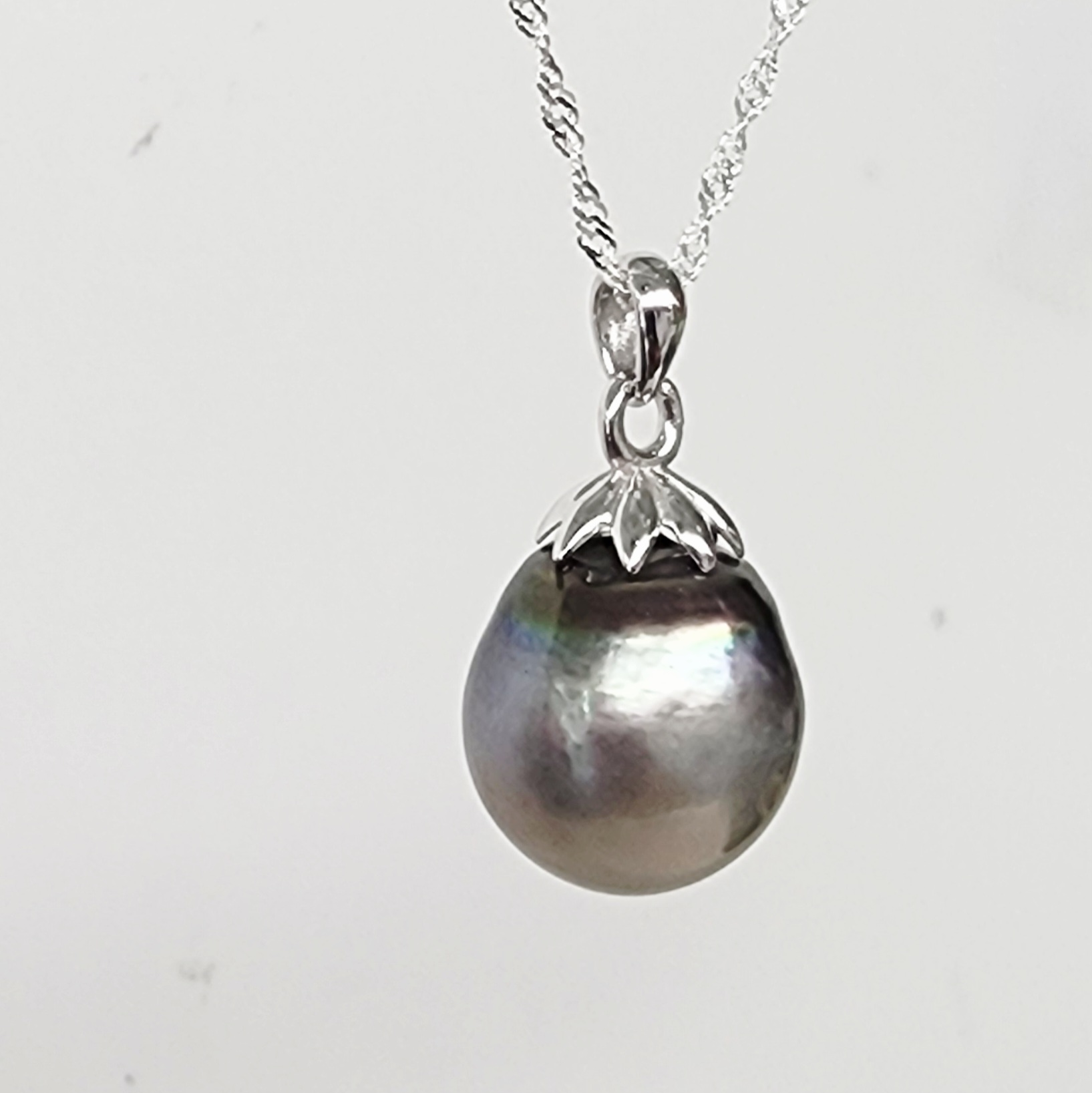 13mm Tahitian Grey Pearl Pendant with Sterling Silver Cap & Complimentary Sterling Silver Chain - SSYZ03 Seiko 13mm Tahitian Grey Pearl Pendant with Sterling Silver Cap & Complimentary Sterling Silver Chain - SSYZ03 Seiko