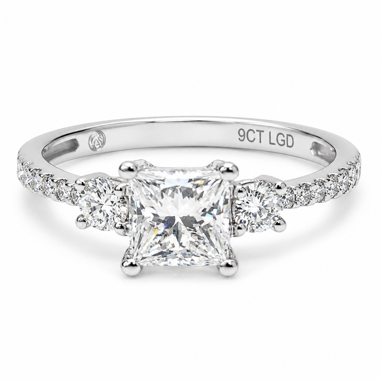 9ct White Gold 1.04ct Lab Grown Diamond Princess Cut Three Stone Engagement Ring - 9WGAURG1929 9ct White Gold 1.04ct Lab Grown Diamond Princess Cut Three Stone Engagement Ring - 9WGAURG1929