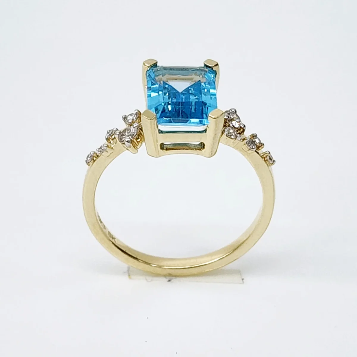 10ct Yellow Gold 0.15ct Diamond & 2.40ct Emerald Cut Blue Topaz Ring - SKR41115BT