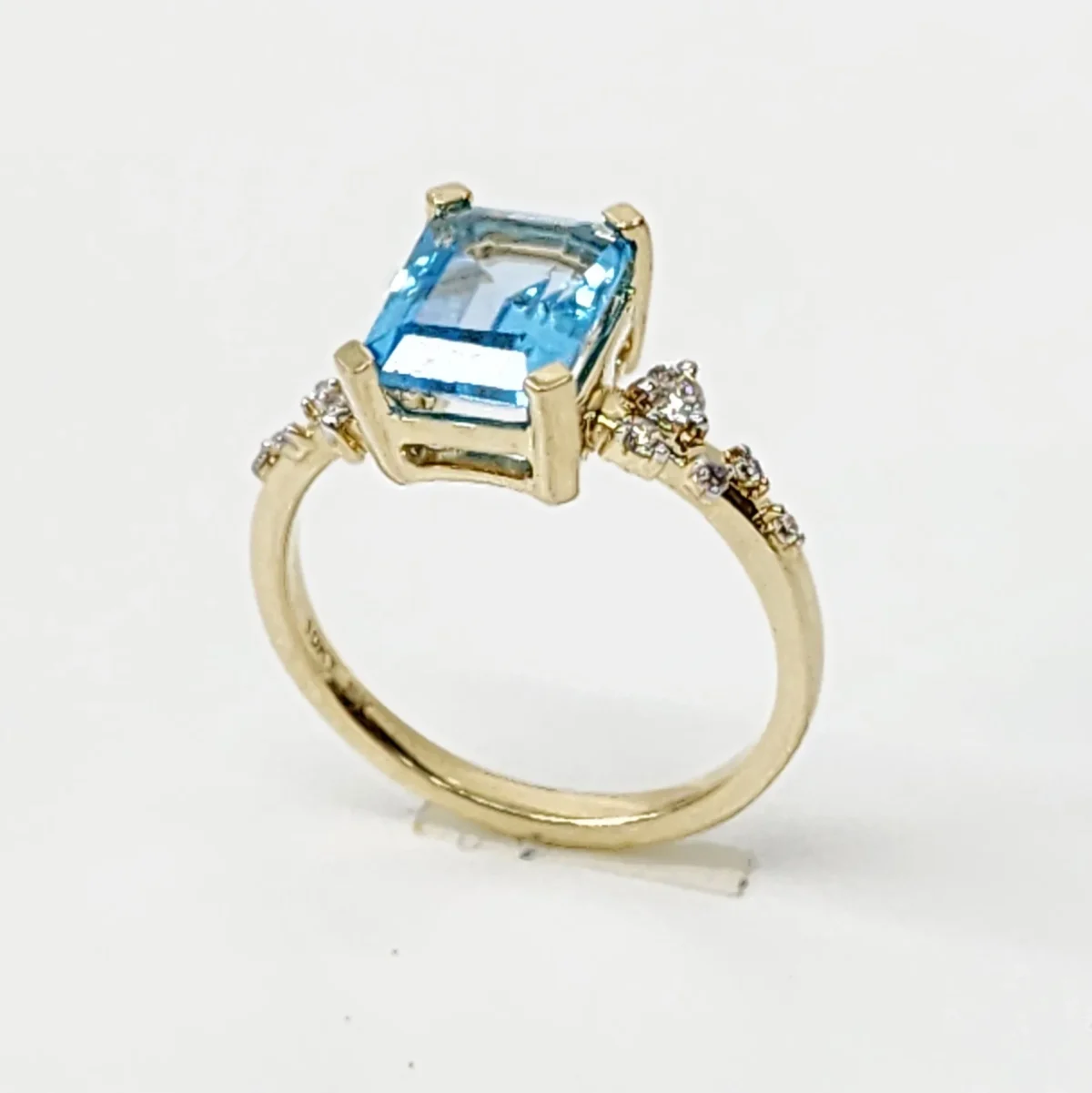 10ct Yellow Gold 0.15ct Diamond & 2.40ct Emerald Cut Blue Topaz Ring - SKR41115BT