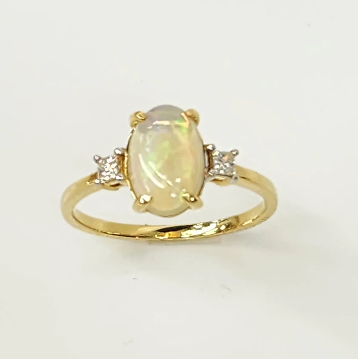 18ct Yellow Gold Oval Opal Ring with Diamond Accents