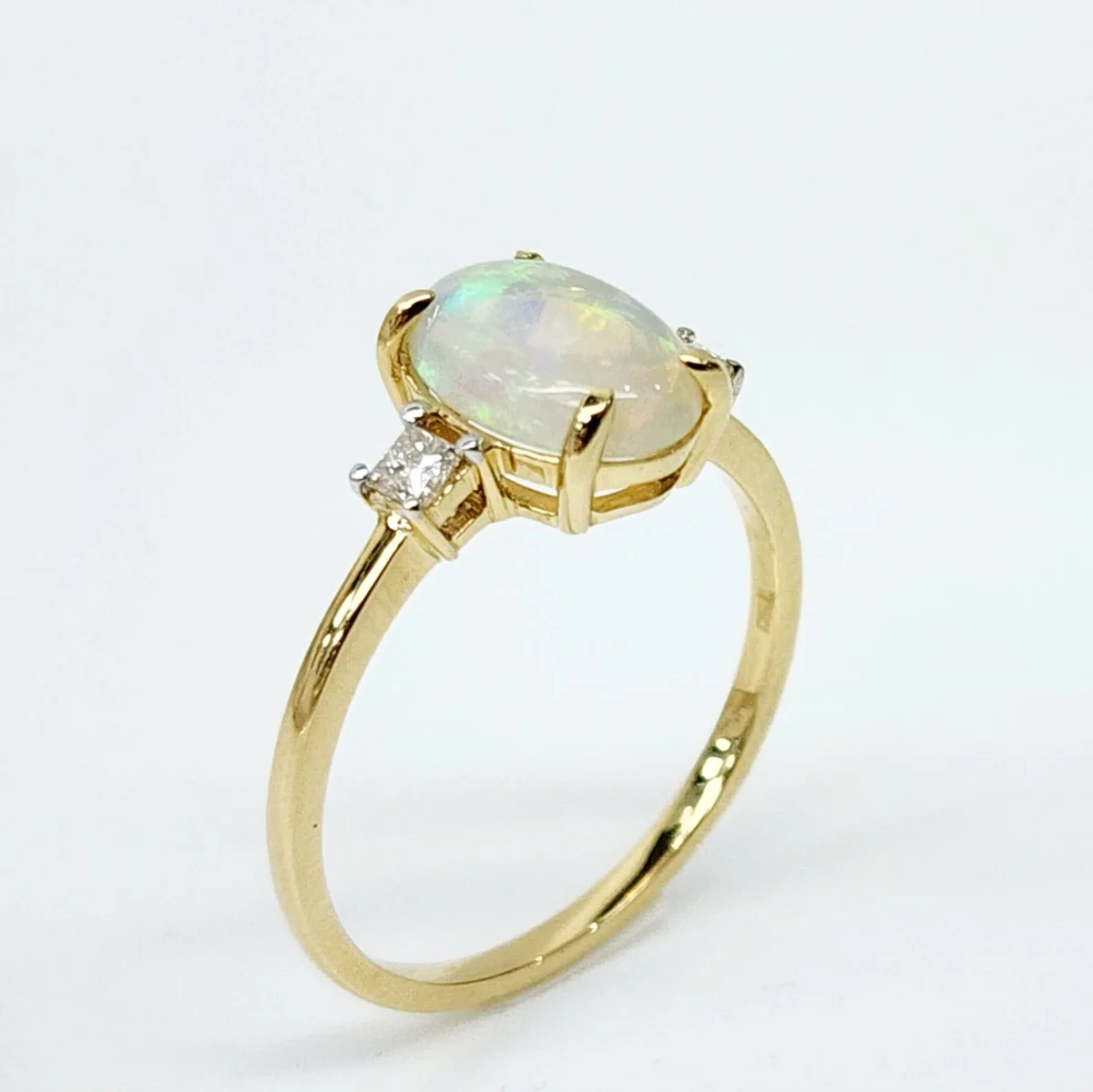 18ct Yellow Gold Oval Opal Ring with Diamond Accents