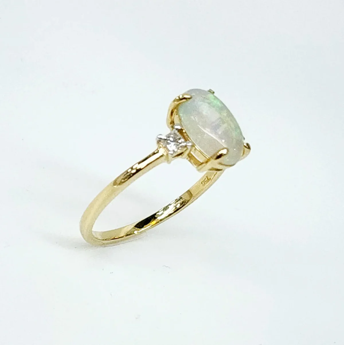 18ct Yellow Gold Oval Opal Ring with Diamond Accents