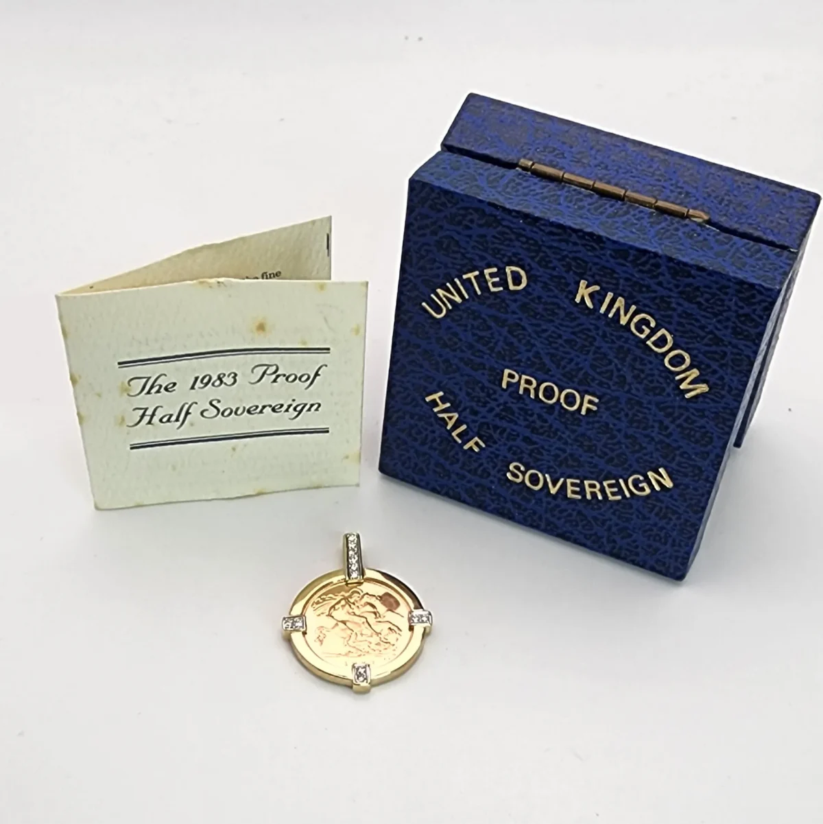 22ct Gold 1983 Elizabeth II Half Sovereign Coin Set in 0.17ct Diamond 9ct Gold Mount