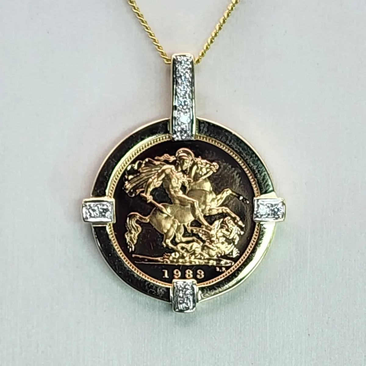 22ct Gold 1983 Elizabeth II Half Sovereign Coin Set in 0.17ct Diamond 9ct Gold Mount