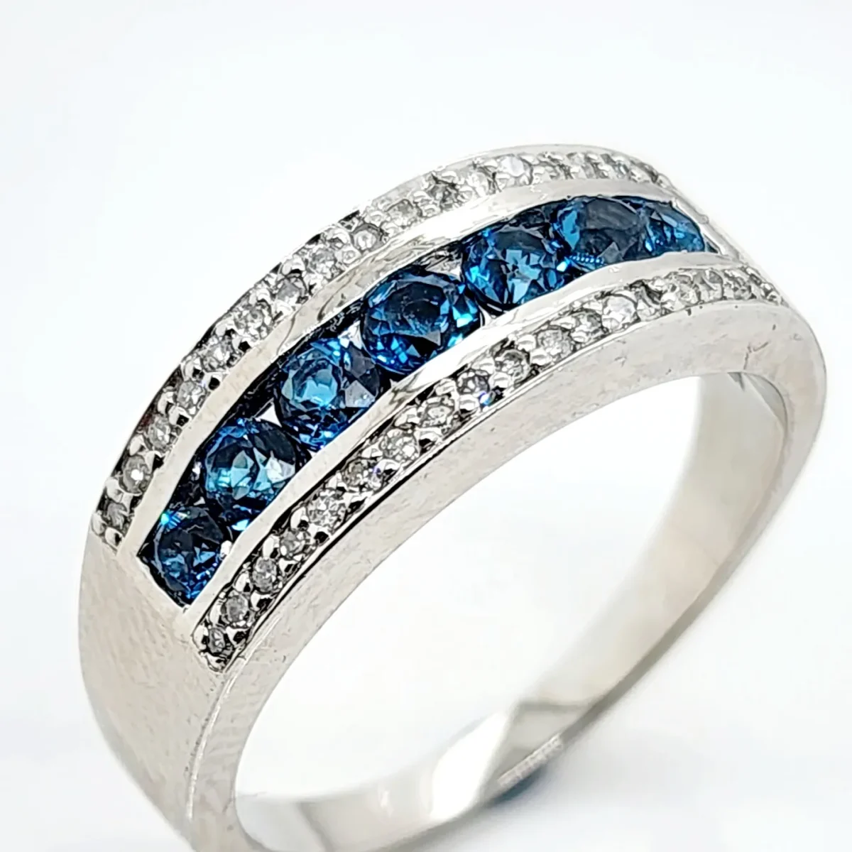 3 Row Ring with Blue Topaz & 0.17 Carat Diamond in 9ct White Gold