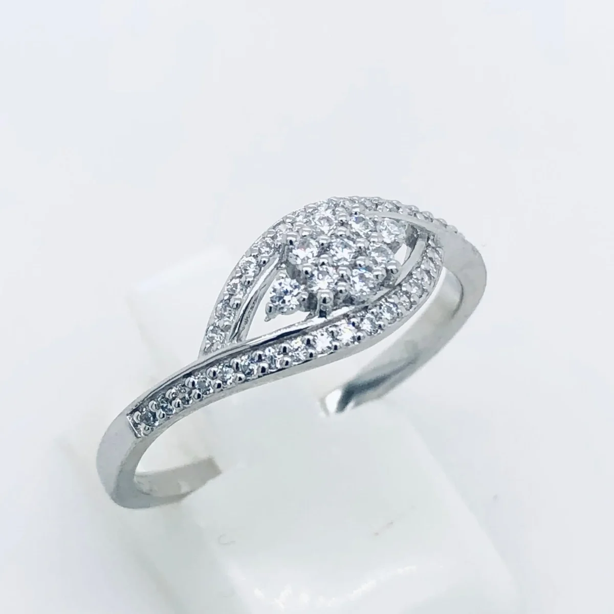 Sterling Silver Crossover Ring With Cubic Zirconia Setting