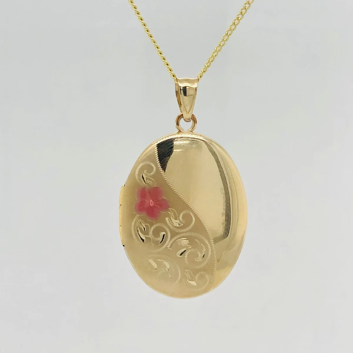 9ct Gold 20mm x 26mm Partly Engraved Oval Locket With Colouerd Enamel Flower