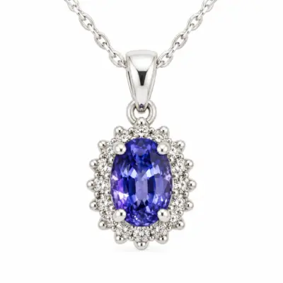 9ct White Gold 1.06ct Ceylon Sapphire with 0.10ct Diamond Halo Pendant