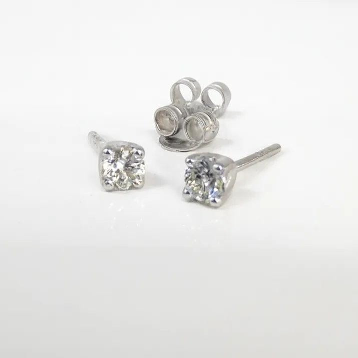 9ct White Gold Diamond Solitaire Stud Earrings – 0.25ct -