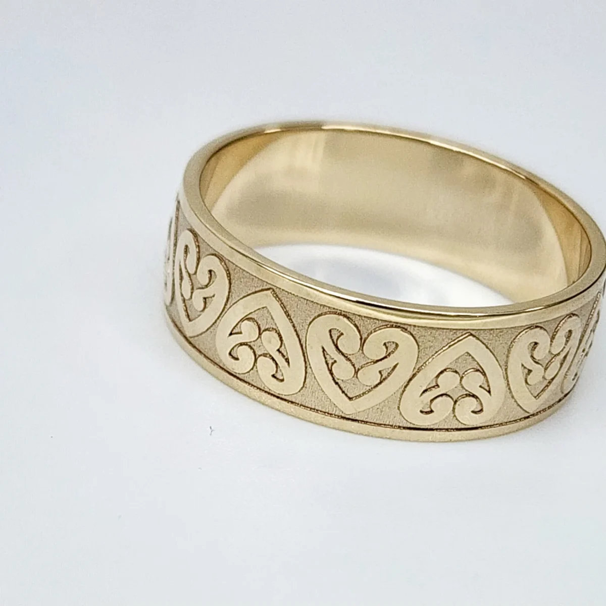 9ct Yellow Gold 8mm Wide Kowhaiwhai Patterned Wedding Ring