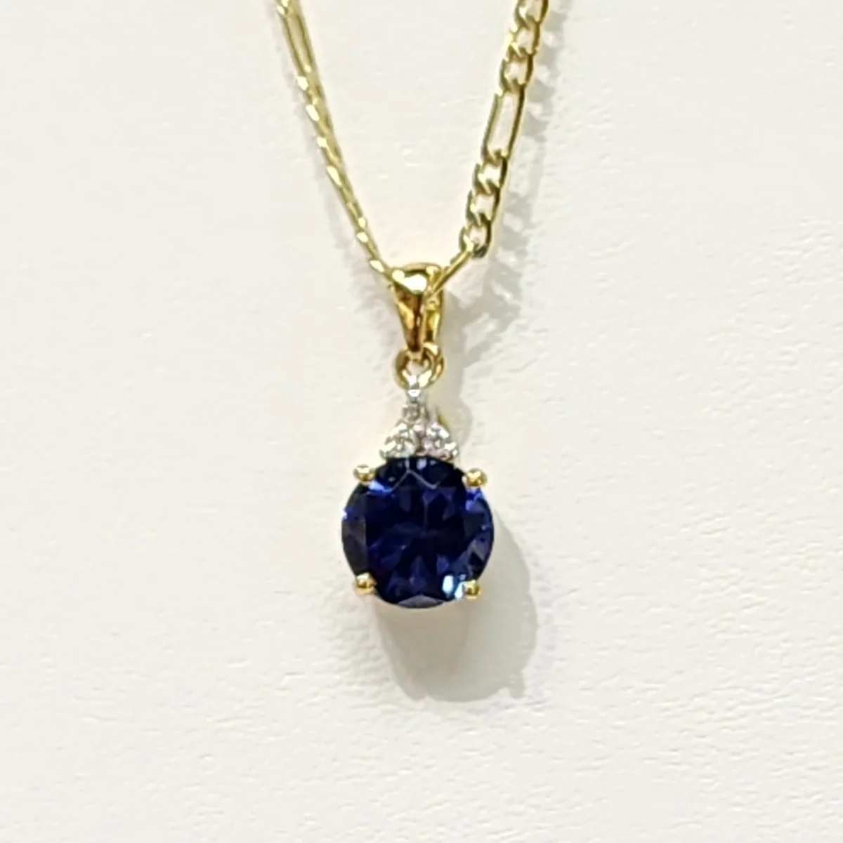 9ct Yellow Gold Created Blue Sapphire with Cubic Zirconia Drop Pendant