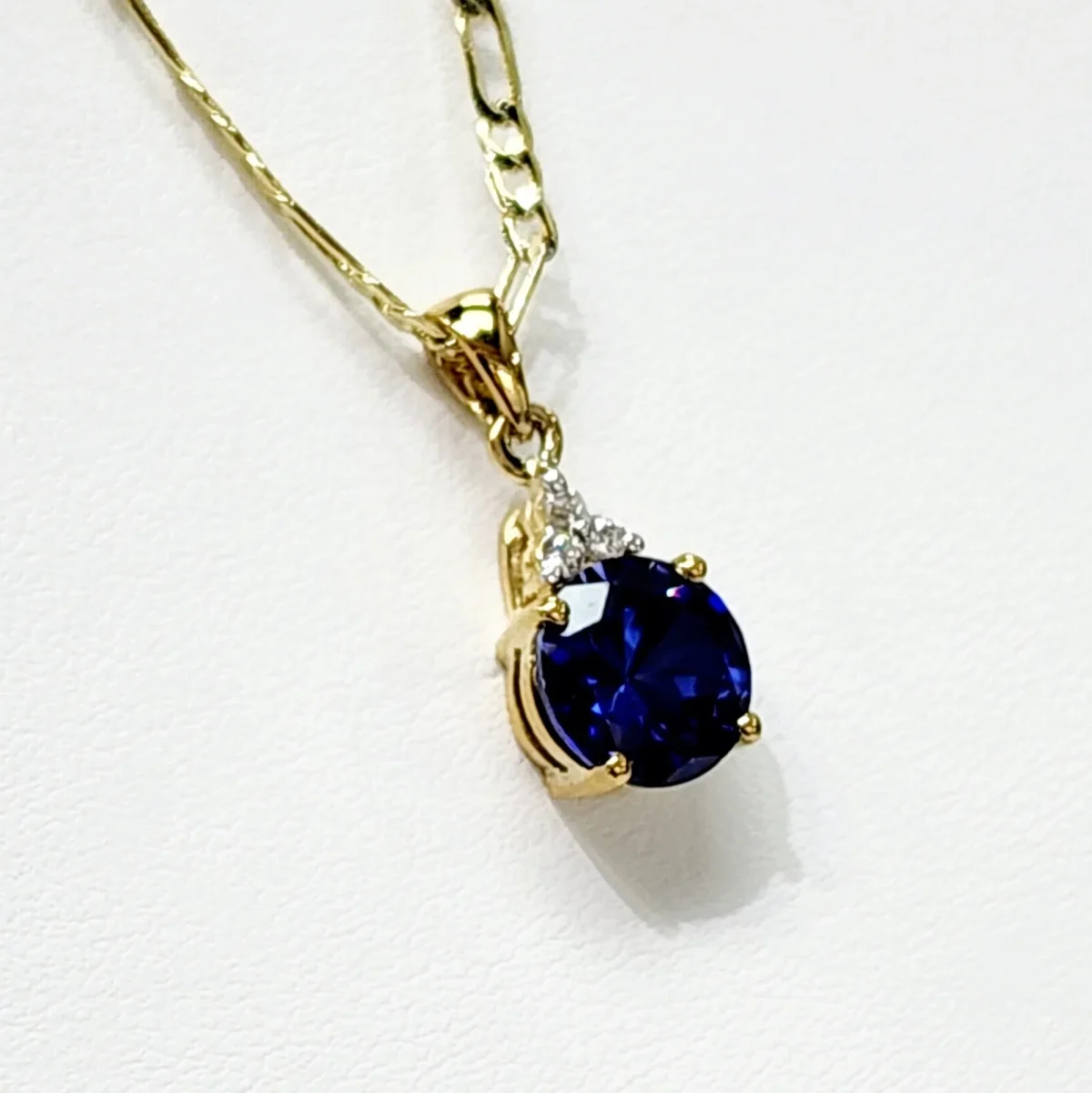 9ct Yellow Gold Created Blue Sapphire with Cubic Zirconia Drop Pendant
