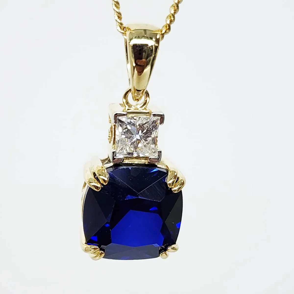 9ct Yellow Gold Cushion Cut Created Ceylon Sapphire and 0.33ct Princess Cut Lab Grown Diamond Pendant - D/A472PD-CCSLGD