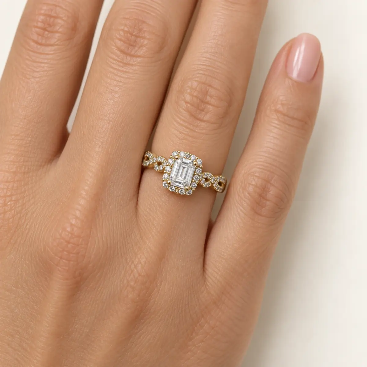 9ct Yellow Gold Emerald Cut CZ Halo Ring with Twisted Diamond-Cut Style Shoulders - AUCRG792