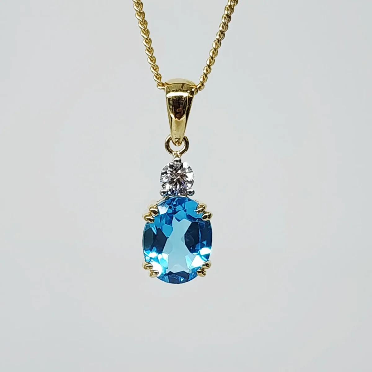 9ct Yellow Gold Oval Cut Blue Topaz and 0.17ct Round Cut Lab Grown Diamond Pendant - D/A470PD-TPZLG