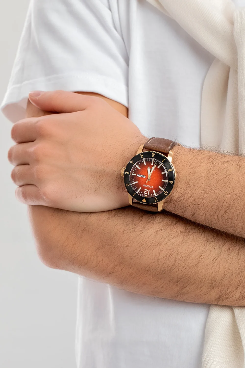 Citizen AW0079-13X Eco-Drive Men’s Watch – Rose Gold Case, Orange Dial, Brown Leather Strap