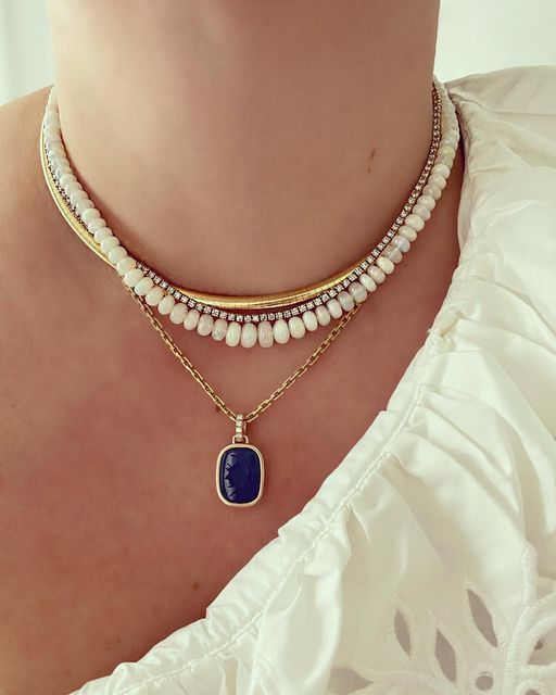 gold necklaces with gemstone embellishments