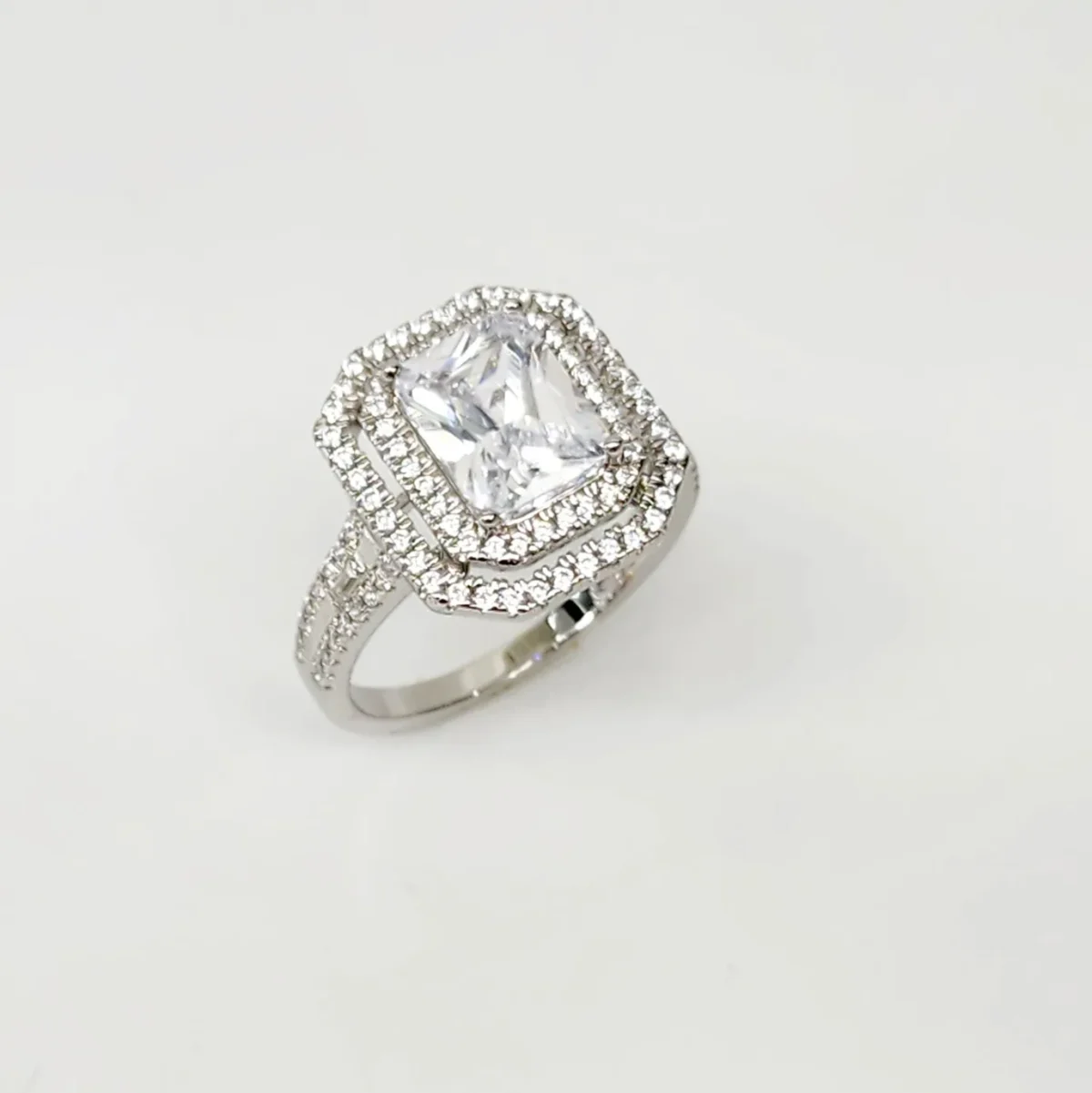 Emerald Cut CZ Engagement Ring with a Double Halo Three Phases Pave Setting in Sterling Silver