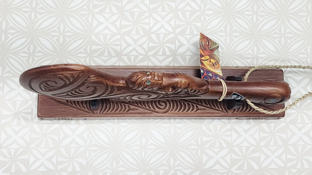 Hand Carved Wahaika on Base with Maori Patterns with Paua Shell Eyes