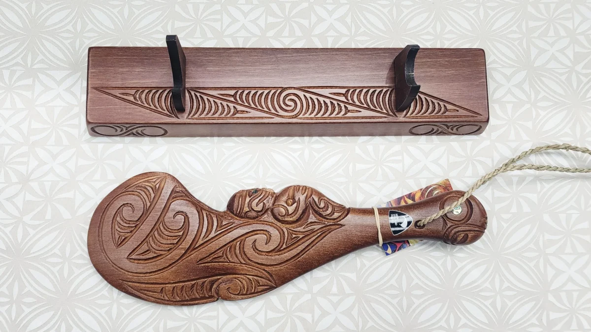 Hand Carved Wahaika on Base with Maori Patterns with Paua Shell Eyes