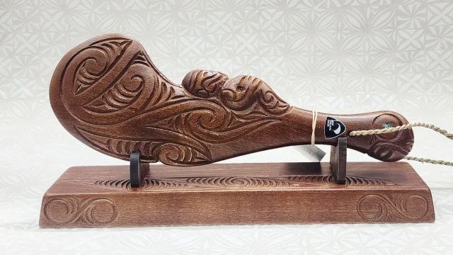 Hand Carved Wahaika on Base with Maori Patterns with Paua Shell Eyes