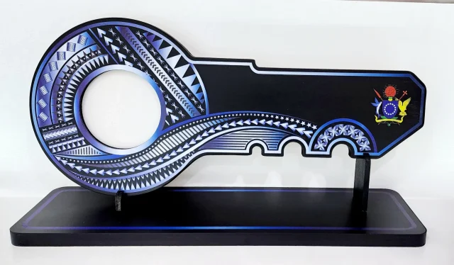 Island Design White & Blue Theme Colour UV Printed Birthday Key with Coat of Arms of Cook Island and Matching Colour Stand