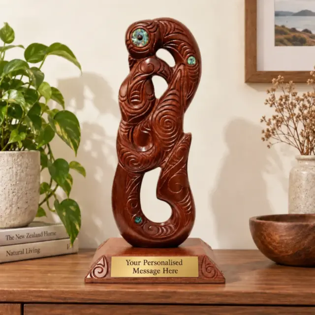 Large Carved Maori Hei Matau (Fish Hook) from Kauri Wood with Paua Shell Eyes on Stand
