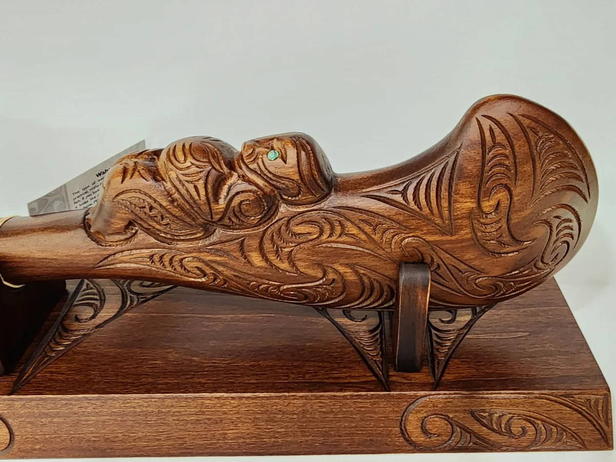 Large Carved Maori Wahaika Club with 50 Paua Inlaid on Stand