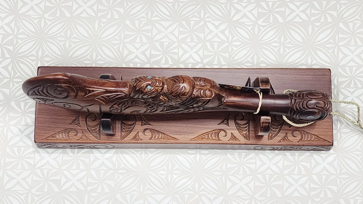 Large Carved Maori Wahaika Club with Carved 21 on Stand