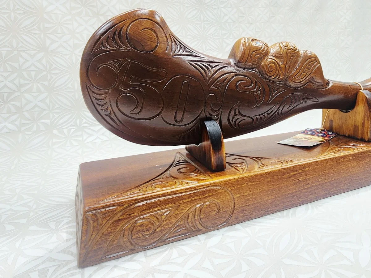 Large Carved Maori Wahaika Club with Carved 50 on Stand