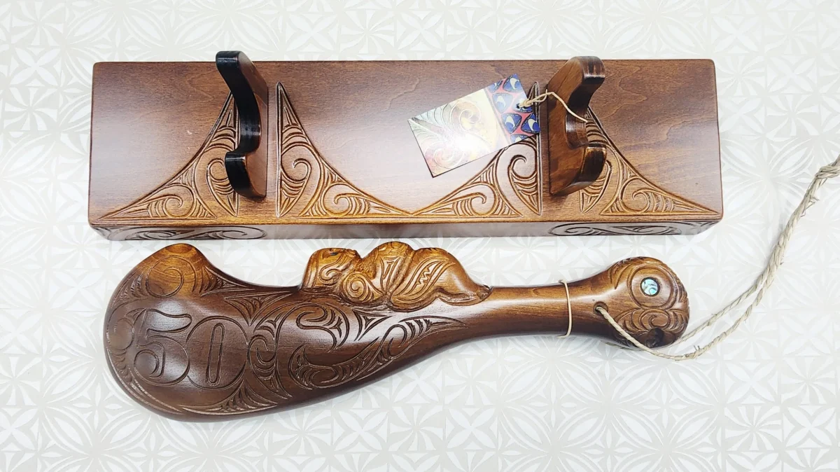 Large Carved Maori Wahaika Club with Carved 50 on Stand