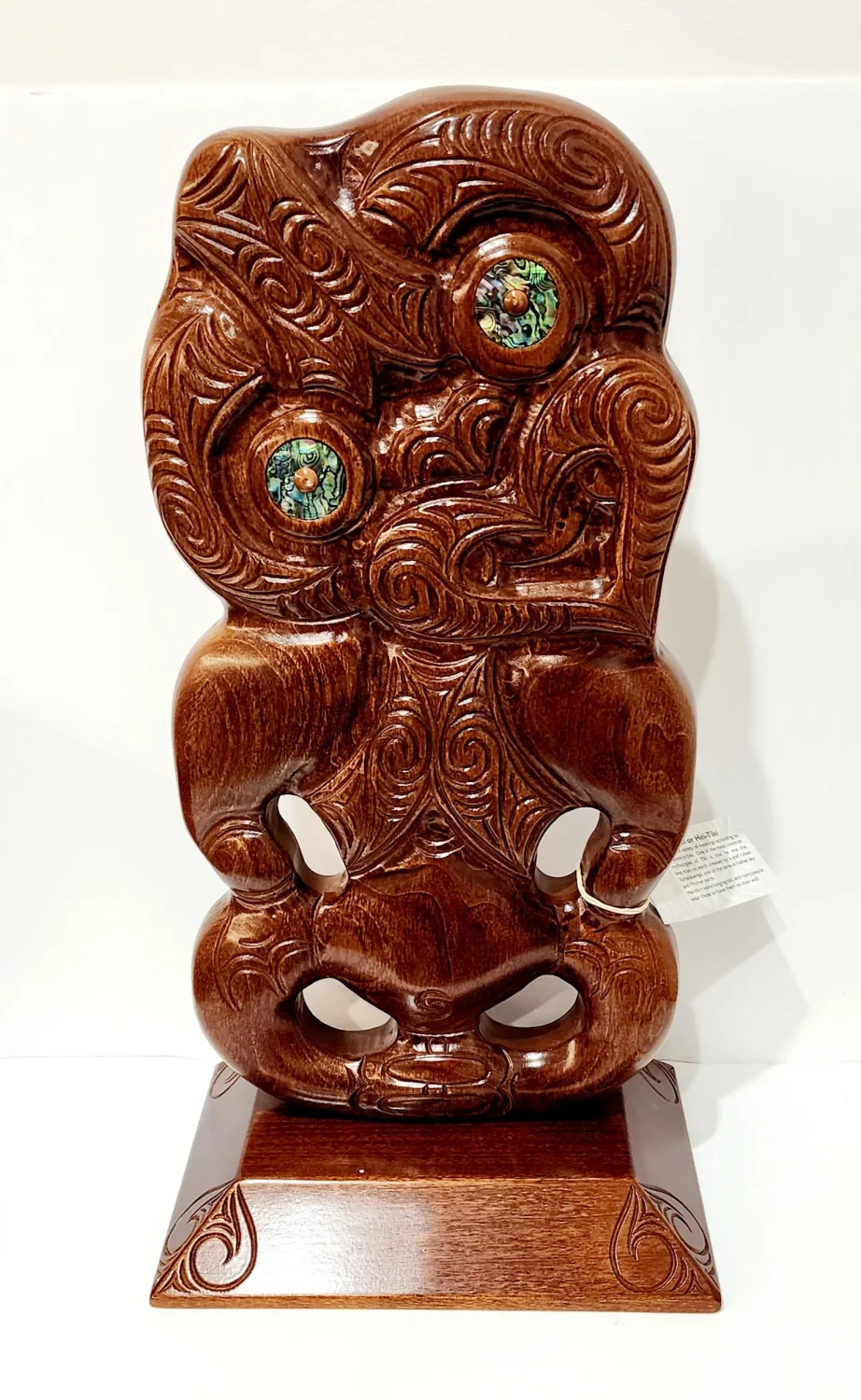 Large Carved Tiki or Hei-Tiki on Base with Paua Shell Eyes Inlay