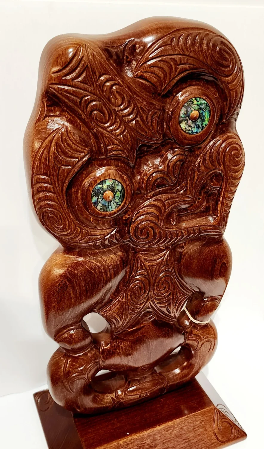 Large Carved Tiki or Hei-Tiki on Base with Paua Shell Eyes Inlay