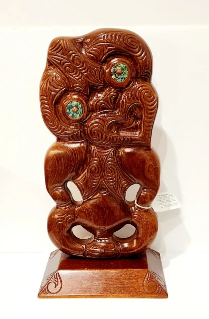 Large Carved Tiki or Hei-Tiki on Base with Paua Shell Eyes Inlay
